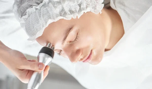 A young women taking RF tightening treatment