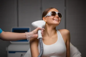 A young women taking laser hair removal treatment for permanent hair fall
