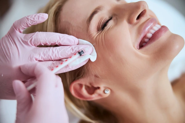 A women taking botox treatment