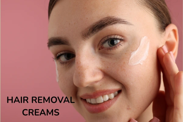 Women applying facial hair removal cream