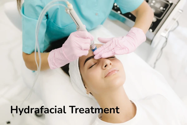 A women taking hydrafacial treatment in a clinical environment 