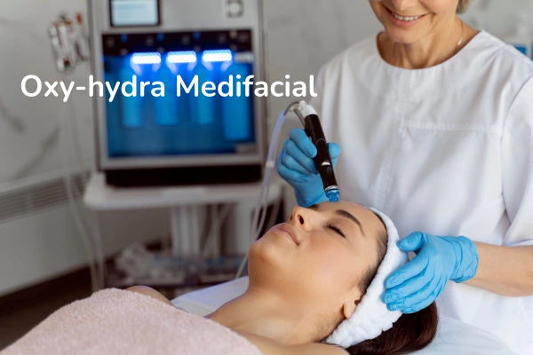 A young women taking oxy hydrafacial treatment