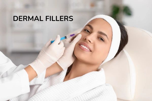 A women taking dermal fillers in a clinical environment